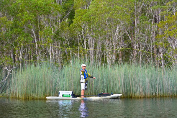 Fly fishing from a stand up paddleboard (SUP) with RAILBLAZA RAILBLAZA